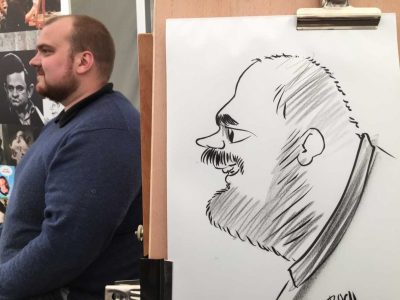 Live karikatur med Allan Buch. sort streg i profil