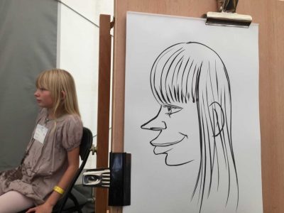 Live karikatur med Allan Buch. sort streg i profil