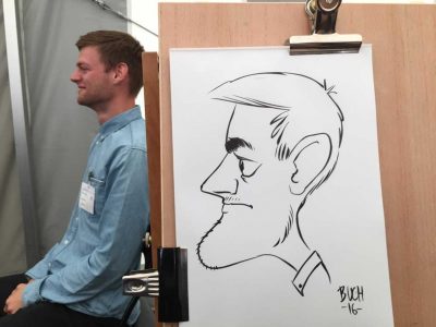 Live karikatur med Allan Buch. sort streg i profil