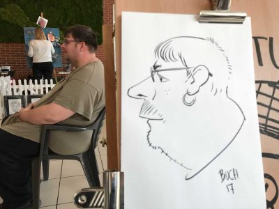Live karikatur med Allan Buch. sort streg i profil