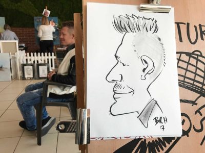 Live karikatur med Allan Buch. sort streg i profil