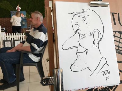 Live karikatur med Allan Buch. sort streg i profil