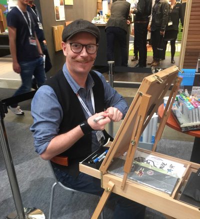 Live karikatur med Allan Buch. sort streg i profil